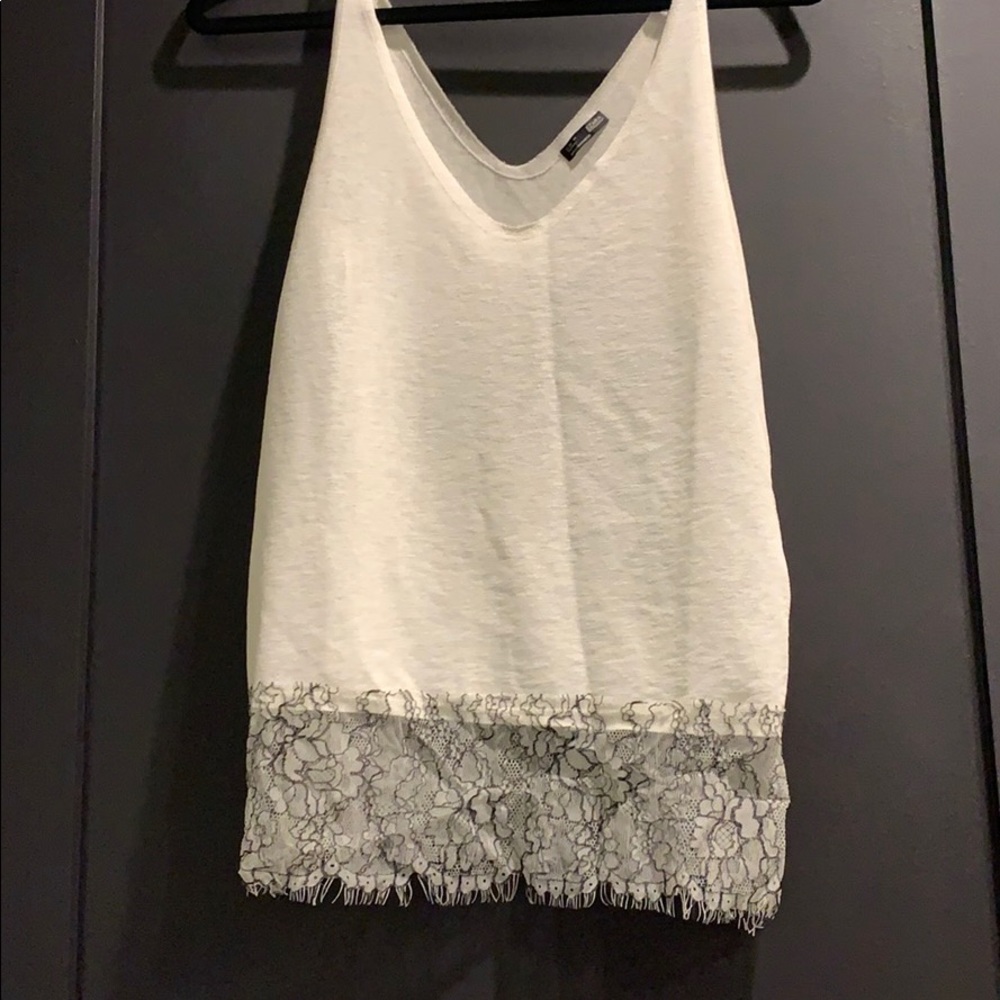 White top with black and white lace trim